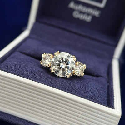 14 yellow gold 4ctw 3ct center and 5mm side diamonds trilogy custom ring