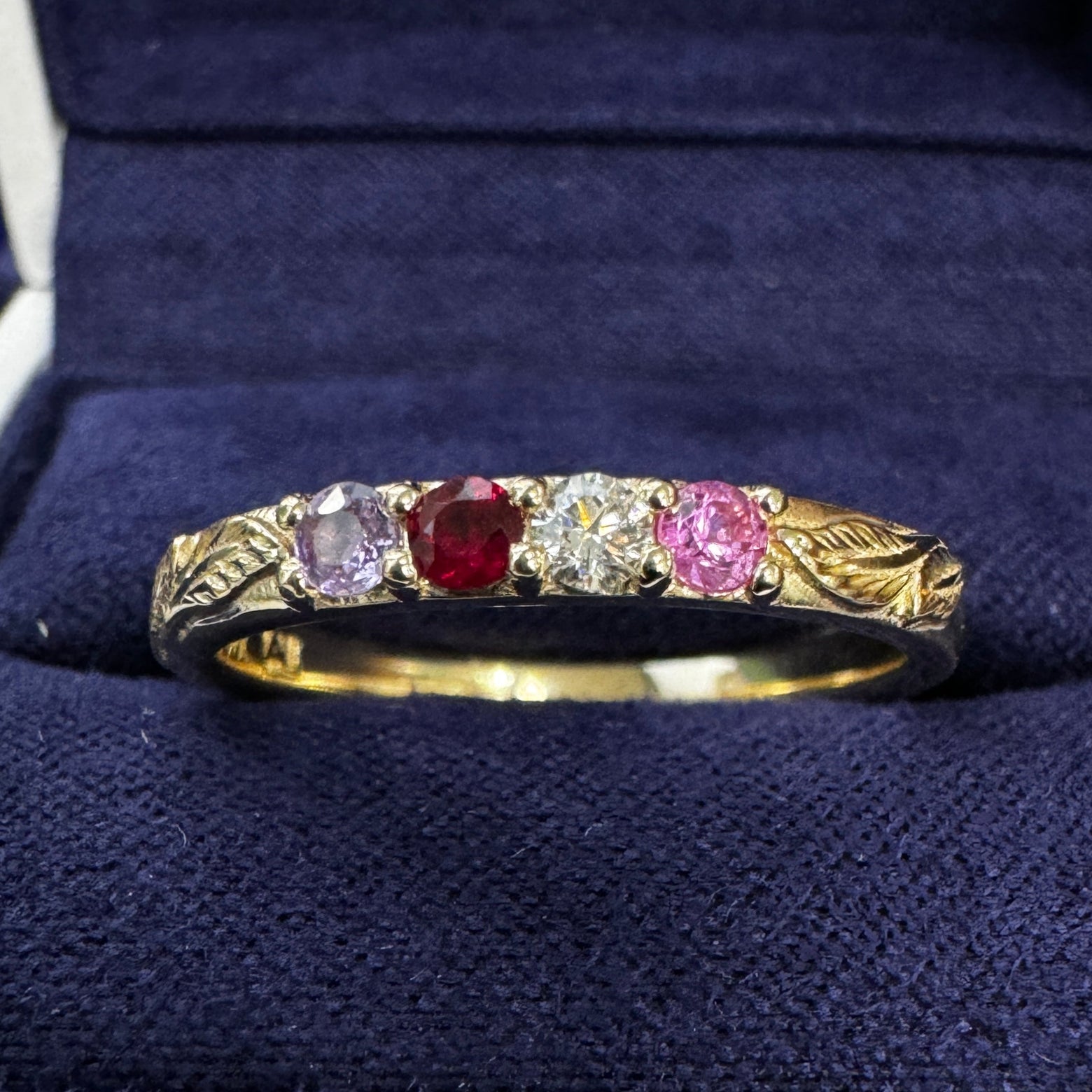 14k Yellow Gold Prongs-set 2.5mm Round Pink Sapphire, Diamond, Ruby, & Purple Sapphire on 2.5mm Leaves Band Custom Ring in a blue ring box