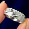 Kite Salt-and-pepper diamond hold by snake ring