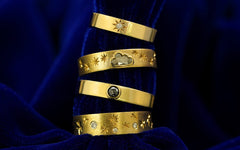 An Engraved Star Diamond Band, Cloud Diamond Band, Diamond Industrial Band, and Stars and Diamond Band stacked