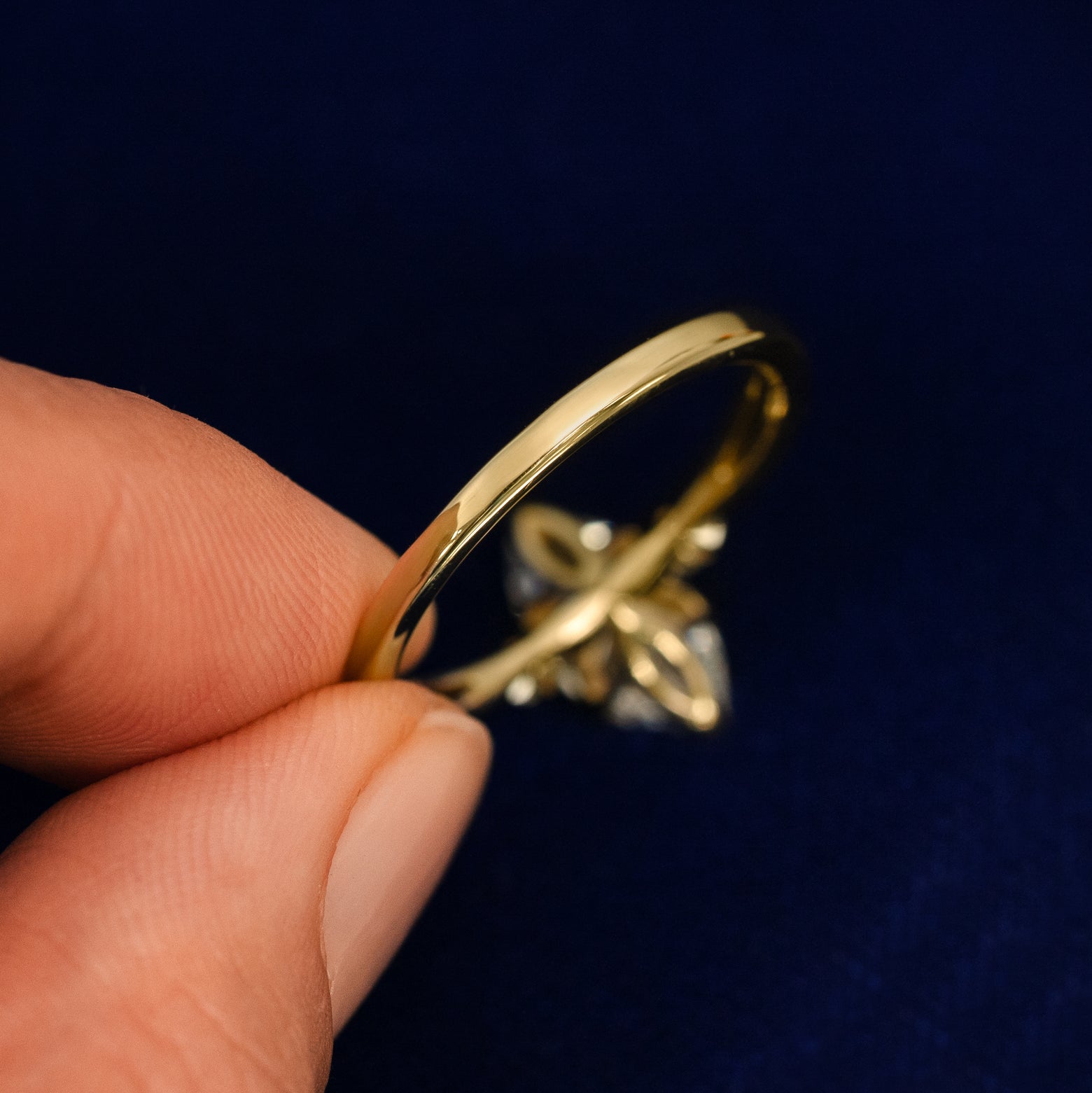 Back view of a solid 14k gold of Marquise Lab Diamond Three Stone Ring
