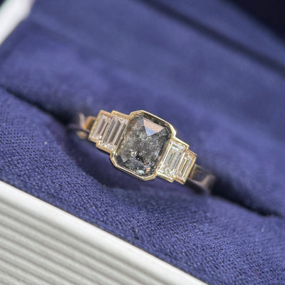 front view of 14k Yellow Gold and 1ct Salt-and-pepper Emerald-cut Diamond with 4pc Baguette Lab Diamonds on 2mm Band Custom Ring, size 5.25