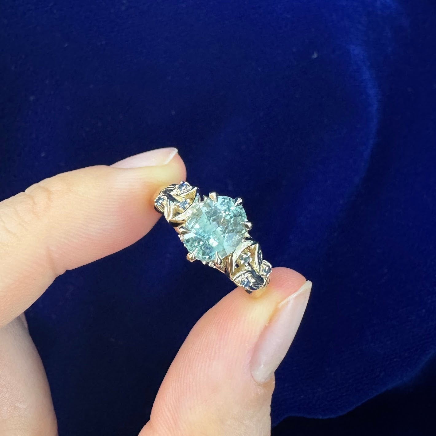 14k Yellow Gold Oval Light Blue Sapphire with Clusters on Leaves and Moons Band Custom Ring