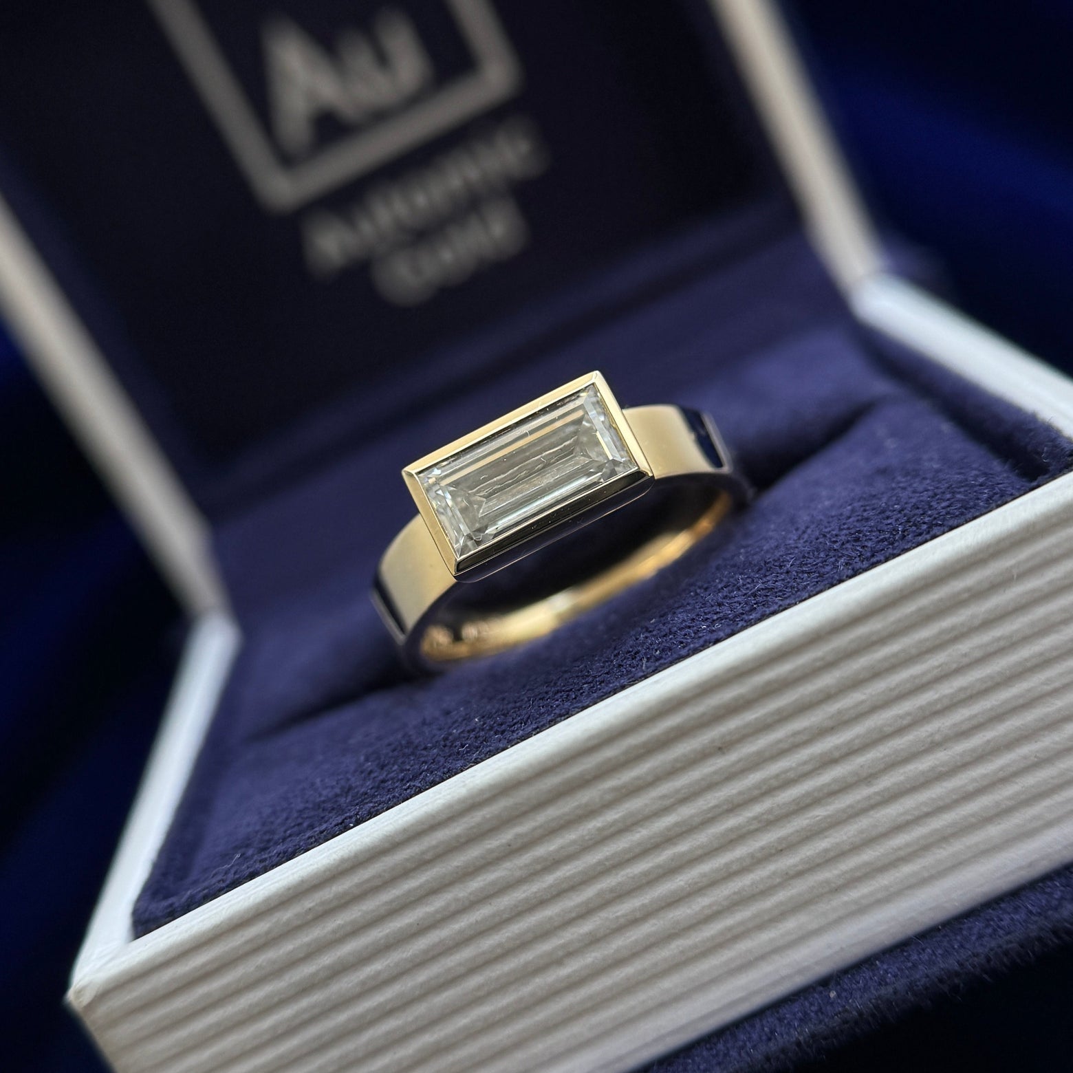 14k Yellow Gold and Bezel-horizontal-set 1.46ct Baguette Lab Diamond on 4mm Industrial Mirror Band Custom Ring, size 5.75
