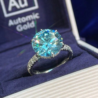 front view of 950 Platinum and 6.55ct Round Light Blue Lab Diamond with Hidden Halo and Pave Band of Lab Diamonds 3/4 around Bands Custom Ring, size 6.75