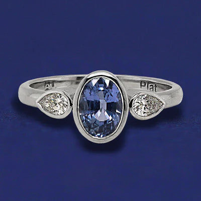950 Platinum Bezel Set Oval Sapphire with Pear Diamonds Custom Ring