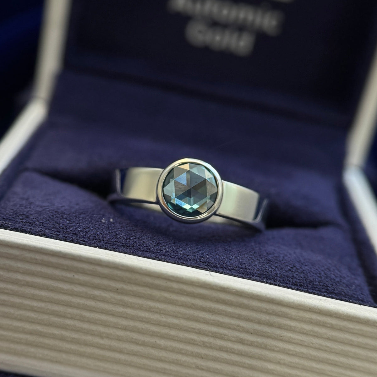 14k White Gold Bezel-set Custom-cut 0.80ct Light Blue Rose-cut Round Lab Diamond on a 4mm Industrial Mirror Band Custom Ring, Size 5.5