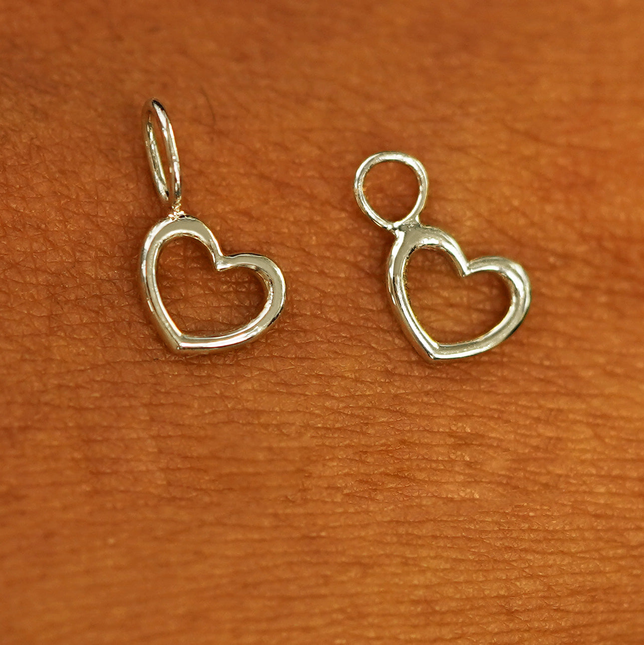 Two 14 karat  Champagne solid gold Heart Charms shown in the For Chain and For Earring options