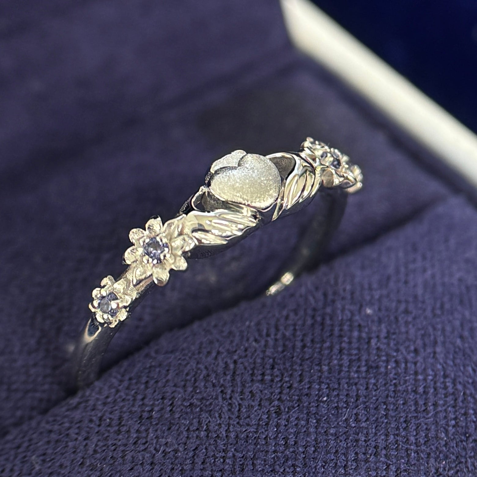 14k White Gold Claddagh in the center with Hyacinth Flowers on sides with Tiny Purple Sapphires inside Custom Ring, 5 gram, Size 7