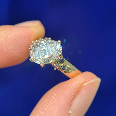 4k Yellow Gold & 2ct E/VVS Oval Lab Diamond & Cluster of Purple Sapphires & Aquarius and Cancer engraved on Band Custom Ring, size 6