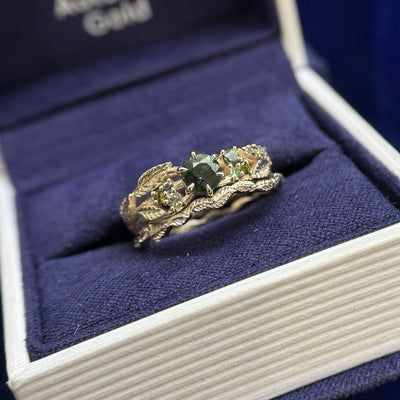 14k Champagne Gold Low-set-6-Claw-prongs 4.5mm 0.50ct Dark Green Sapphire with Cluster of Sapphires on Leaves and Branches Band, Size 6 and 14k Champagne Gold Nesting Leaves Thin Band Custom Ring, Size 6