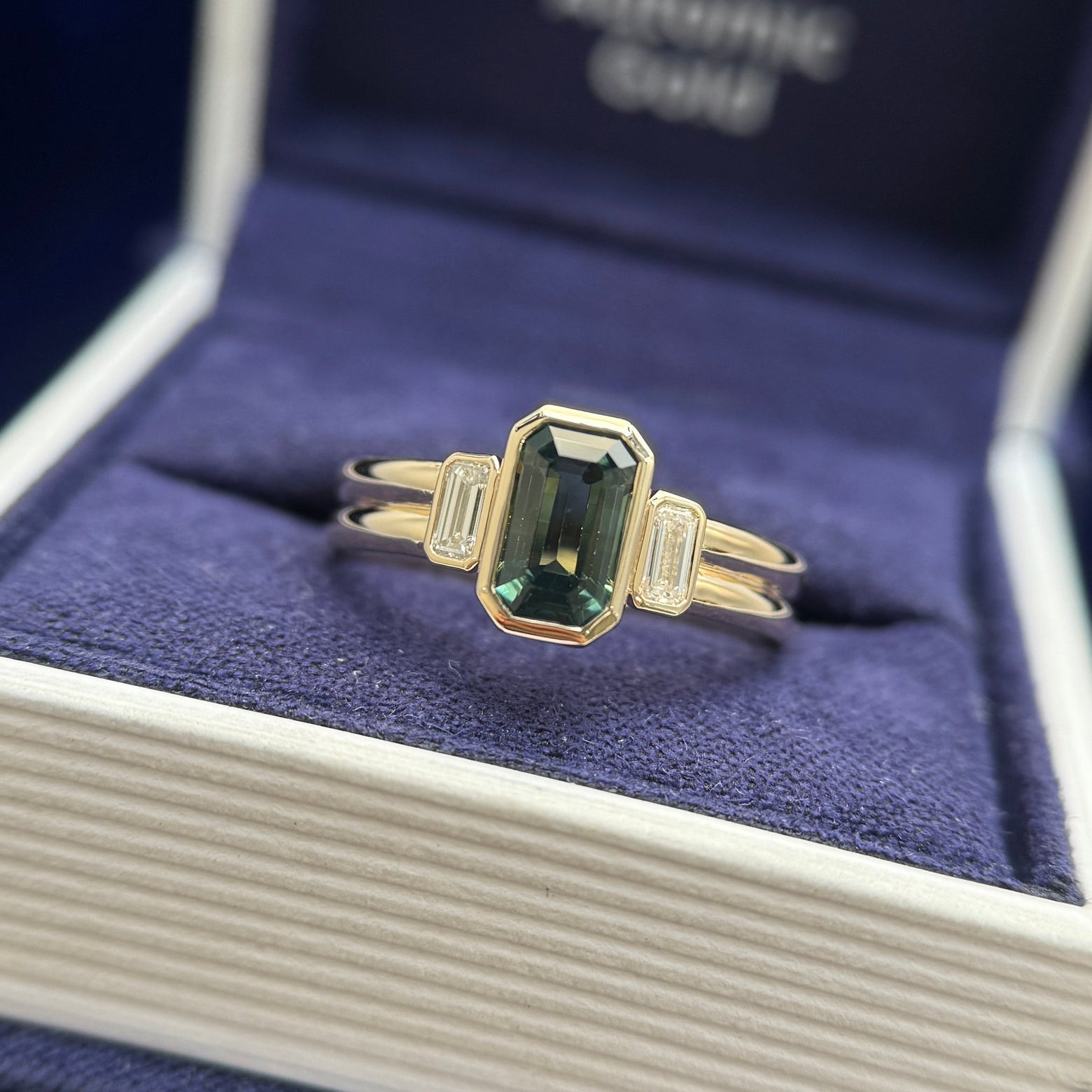 14k Yellow Gold and Low-bezel-set 1.6ct 8x4.9mm Emerald-cut Bi-color Sapphire with 2pc Baguette Lab Diamonds on Double Band Custom Ring, size 7.75