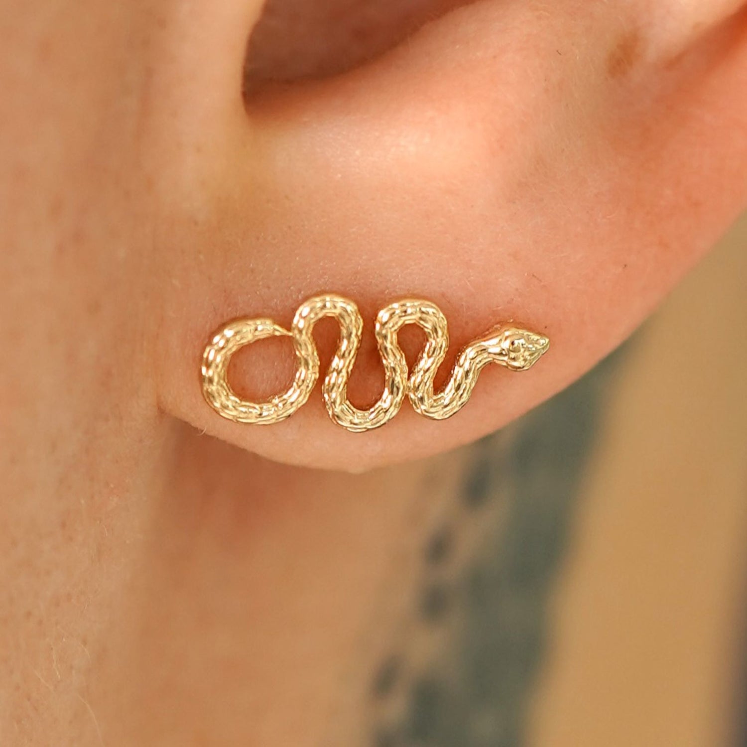 14k gold gold snake cartilage earring
