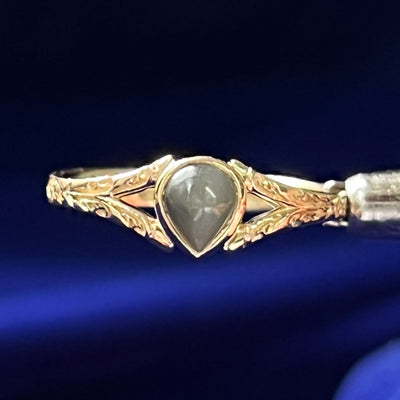 14k Yellow Gold Gray Pear Cabochon Natural Sapphire with Antique Engravings Open Band Custom Ring