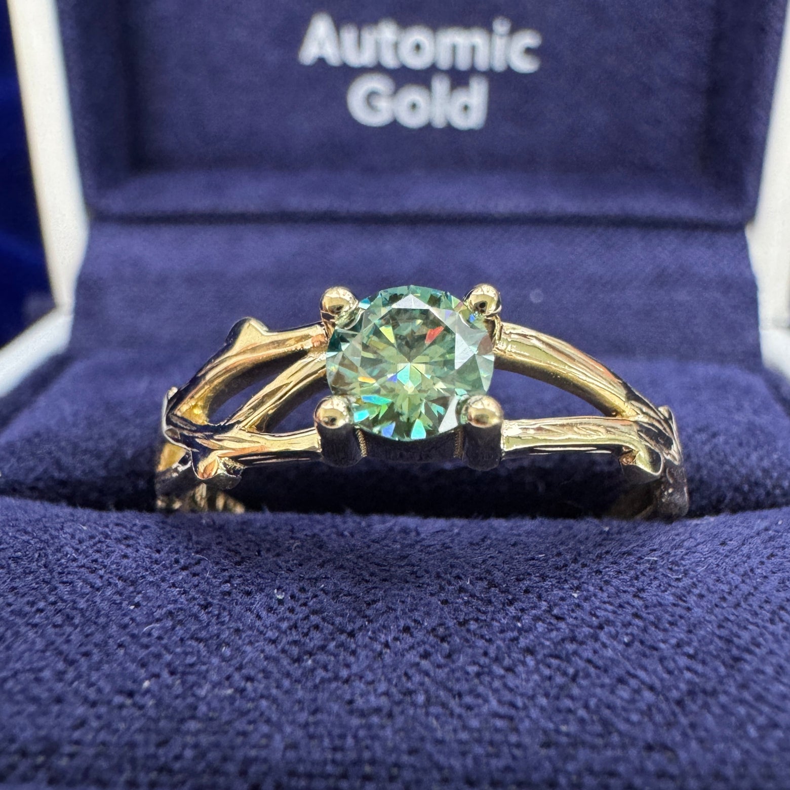 14k Yellow Gold & 4-round-prongs-set 5mm Green Round Moissanite on our Moissanite Branches but Polished Branches Custom Ring, size 8.25