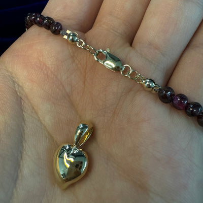 A heart pendant and necklace's clasp