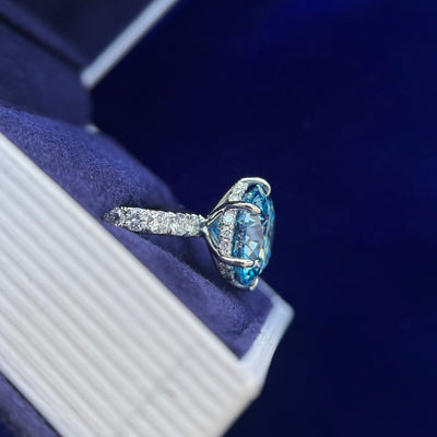 side view of 950 Platinum and 6.55ct Round Light Blue Lab Diamond with Hidden Halo and Pave Band of Lab Diamonds 3/4 around Bands Custom Ring, size 6.75