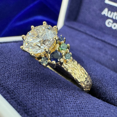 14k Yellow Gold Prongs-set 1.50ct D/VS 7.3mm Round Lab Diamond w/ Blue/Teal/Green Sapphires Cluster on 3.5mm Mix Mirror Band Custom Ring