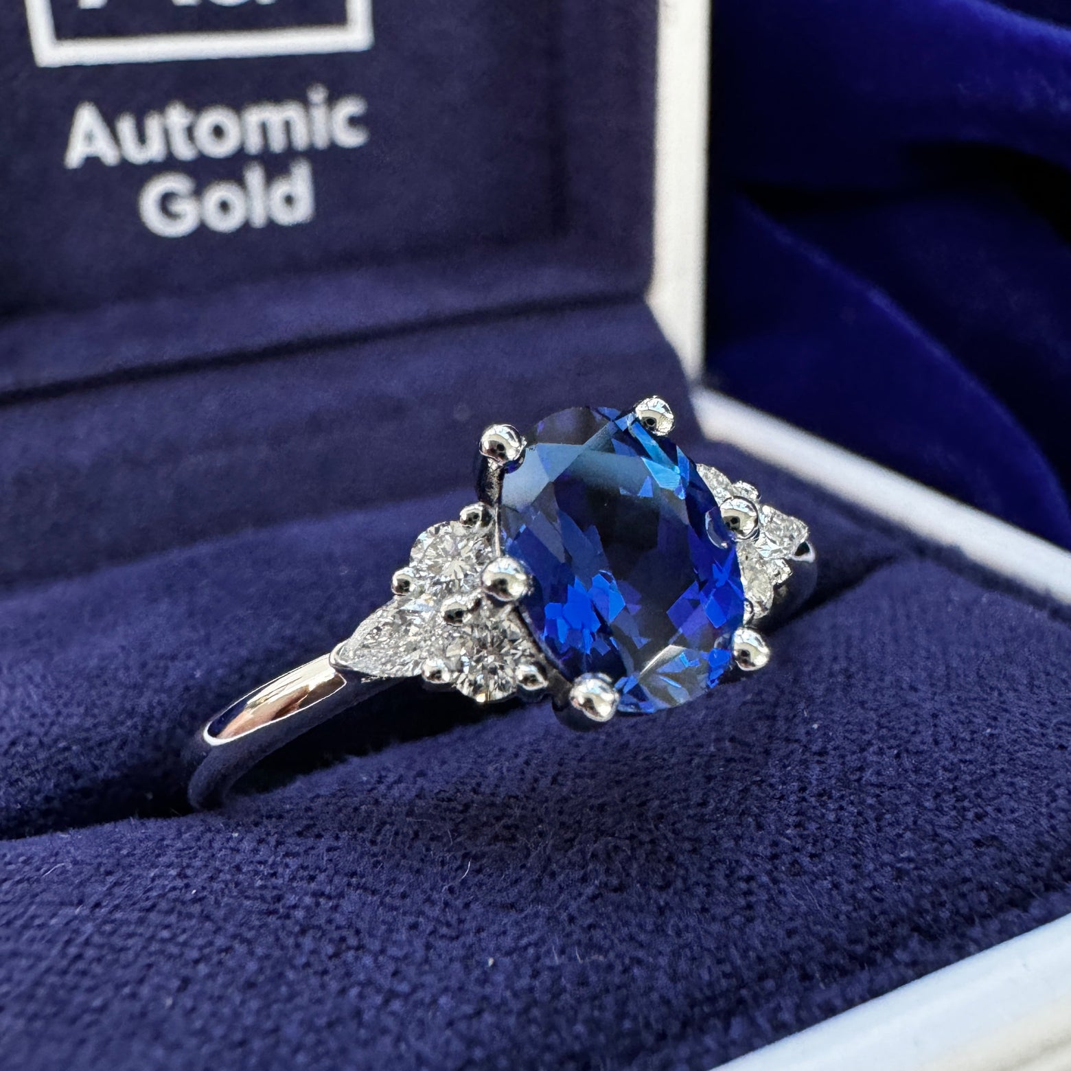14k White Gold Six-round prongs-set 8x6mm Oval Lab Sapphire w/ 4pc 2mm Round & 2pc 3x1.5mm Marquise Lab Diamonds on 2mm Curvy Band Custom Ring