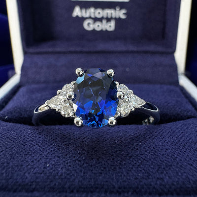 14k White Gold Six-round prongs-set 8x6mm Oval Lab Sapphire w/ 4pc 2mm Round & 2pc 3x1.5mm Marquise Lab Diamonds on 2mm Curvy Band Custom Ring