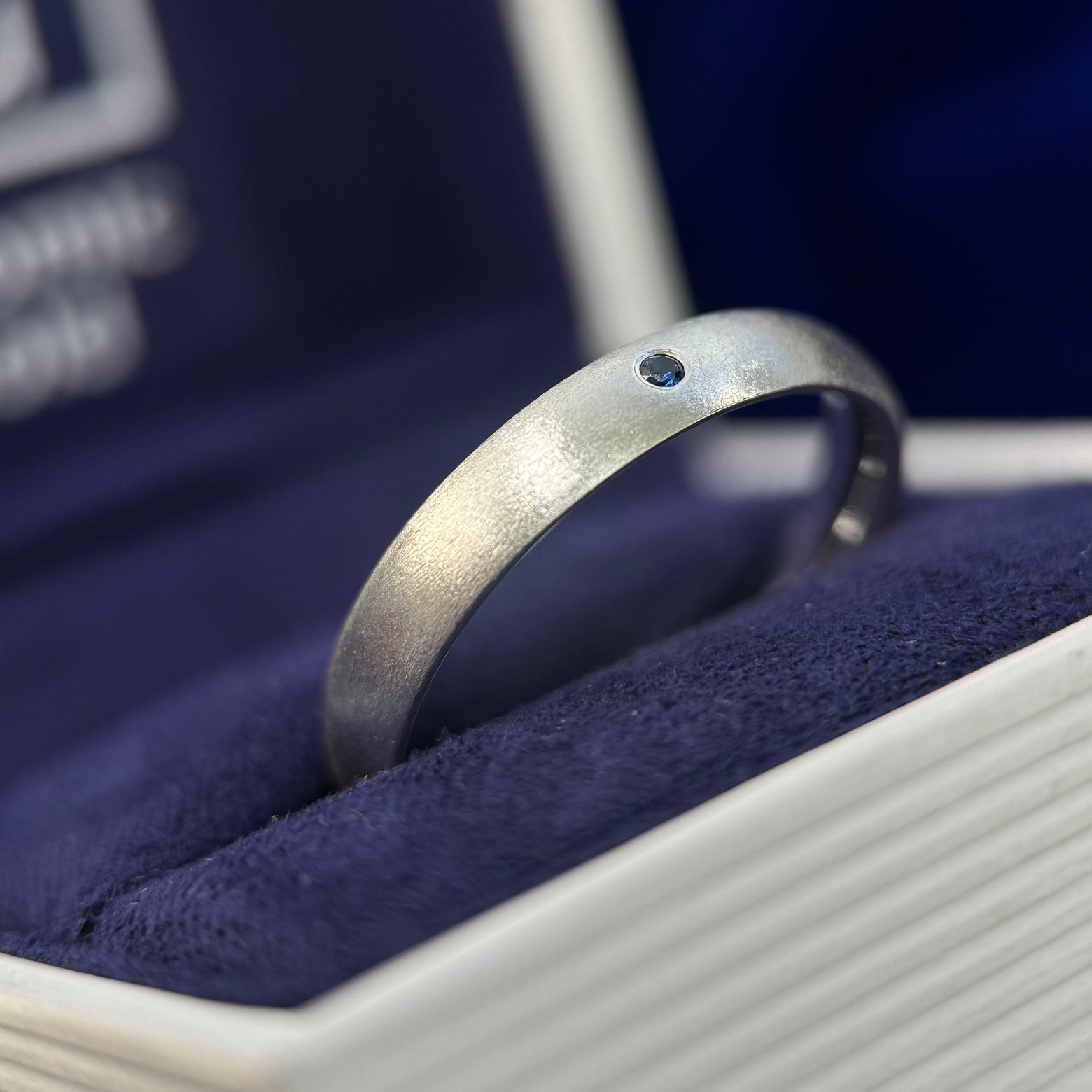 14k White Gold & Flash-set 1.5mm round Lab Sapphire on 4mm Curvy Matte Custom Ring