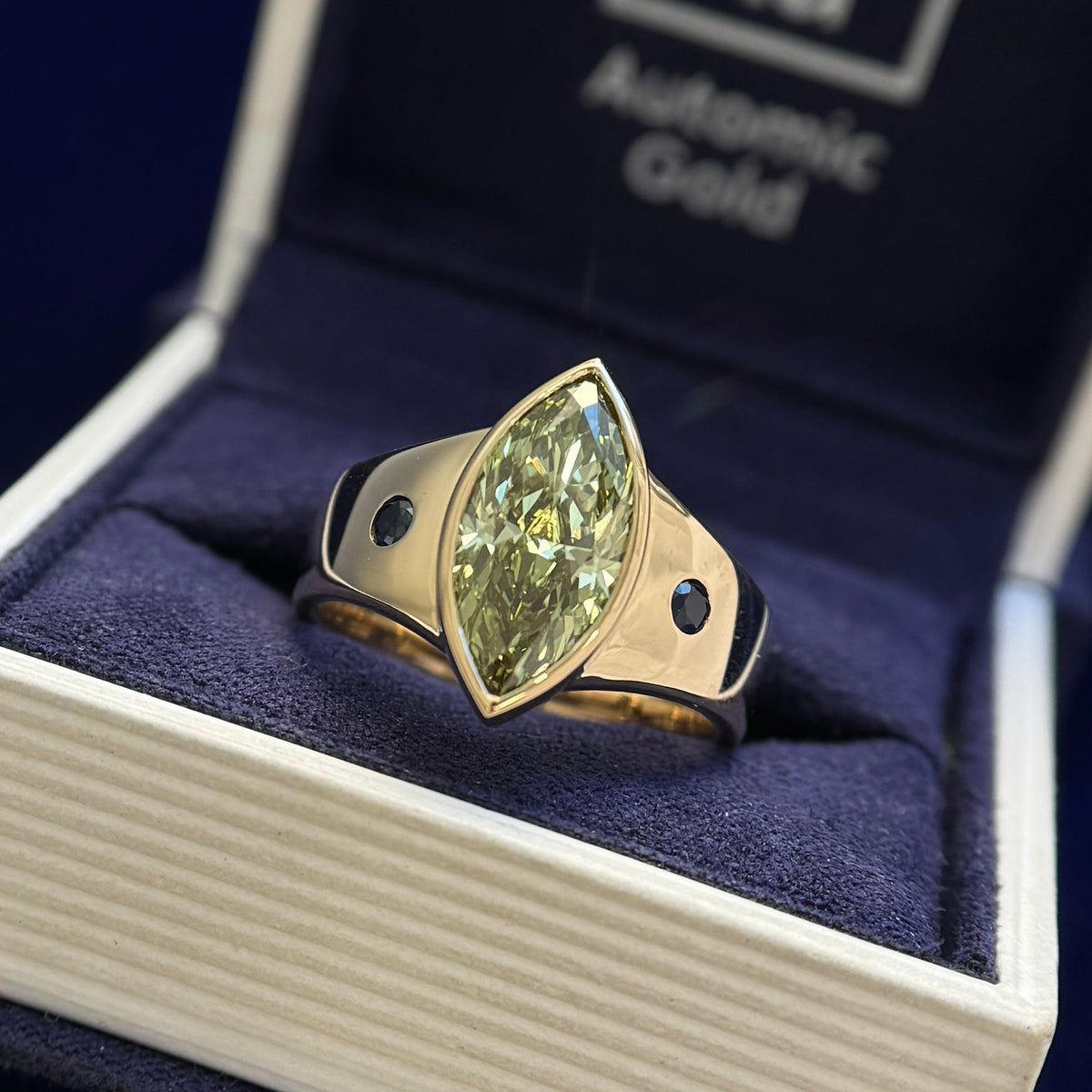 14k Yellow Gold and Low-bezel-set 2.98ct Green Marquise Lab Diamond with 2pc 2mm Lab Sapphires on Tapered Band Custom Ring, size 10.5
