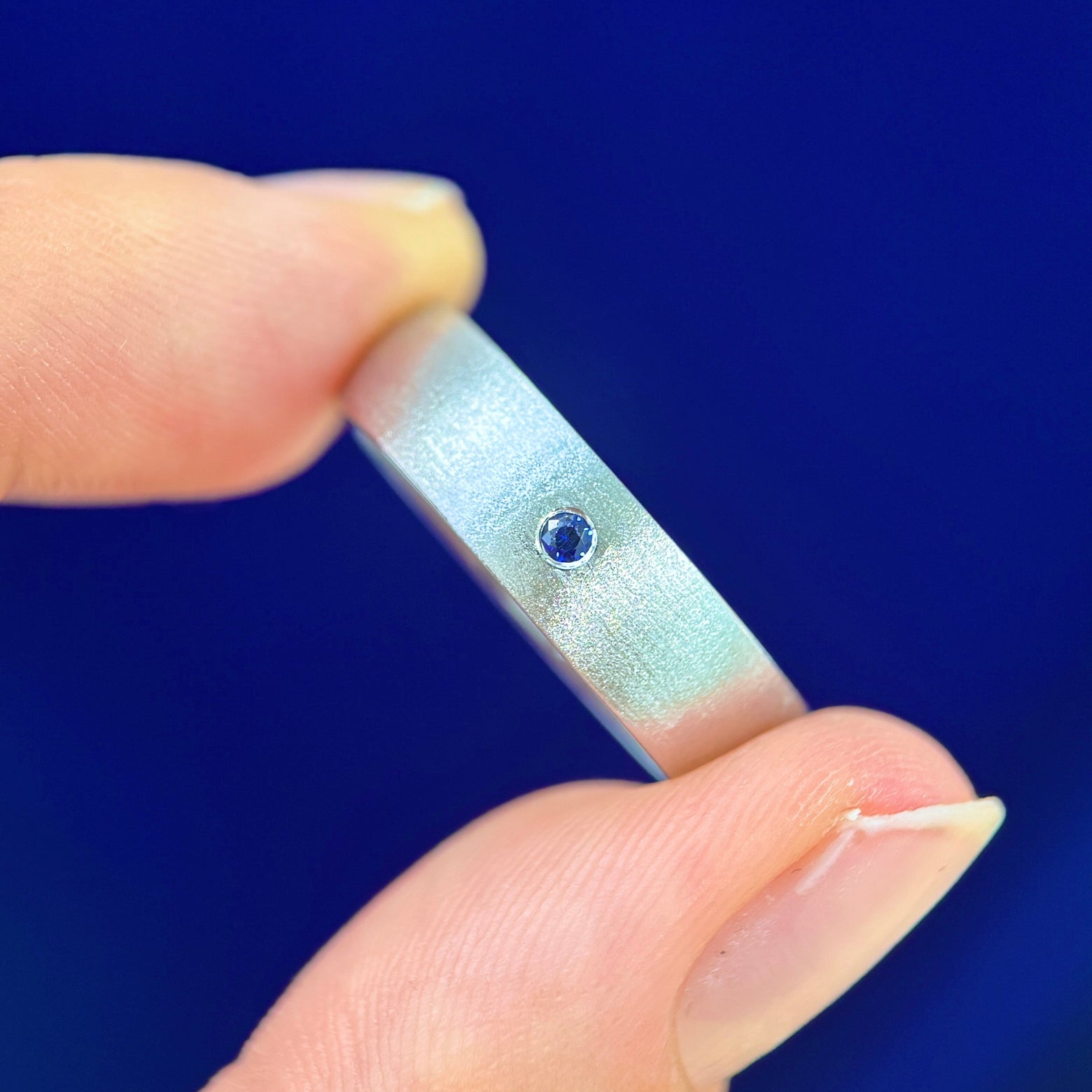 14k White Gold Remelted into 6mm Curvy Matte Band & Flash-set 2mm Round Lab Sapphire Custom Ring, size 10.5