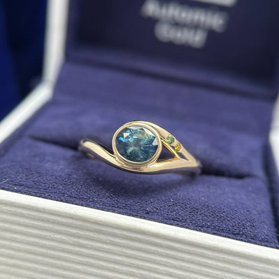 14k Yellow Gold 1.12ct Oval Bi-color Sapphire set into Wavy Band with Green and Yellow Diamonds Asymmetrical Band Custom Ring, Size 6