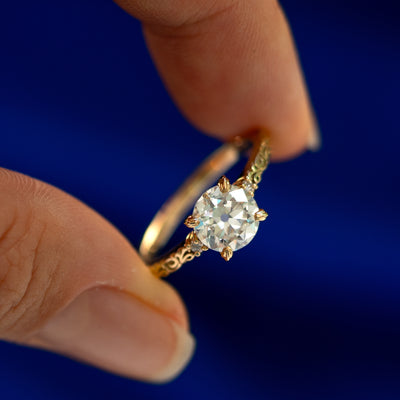 An angled view of an Old Mine Cut Lab Diamond Filigree Ring to show the facetes on the stone