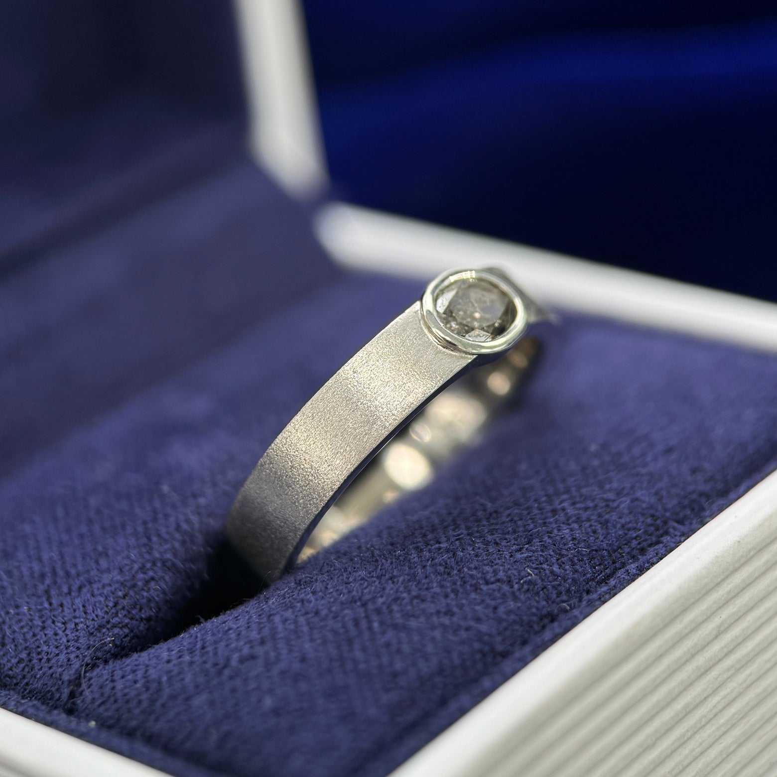 950 Platinum & Bezel-sideways-set 0.40ct Oval Salt-and-pepper Diamond on 4mm Industrial Matte Band, size 6.5