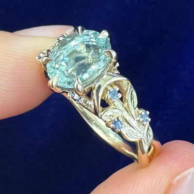 14k Yellow Gold with2.21ct 8.1x6.5mm Oval Sapphire set into Leaves and Moons with Round Small Sapphires Custom Engagement Ring, size 7
