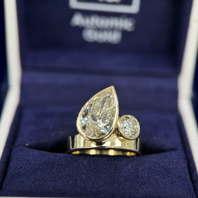 14k Yellow Gold Bezel Set Round and Pear Lab Diamonds on 4mm Industrial Band Custom Ring