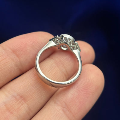 950 Platinum and Clients Round Diamond reset into 6 claws low set with two Bezel-set Triangles Diamonds on Thin to Thick Band Custom Ring, size 5