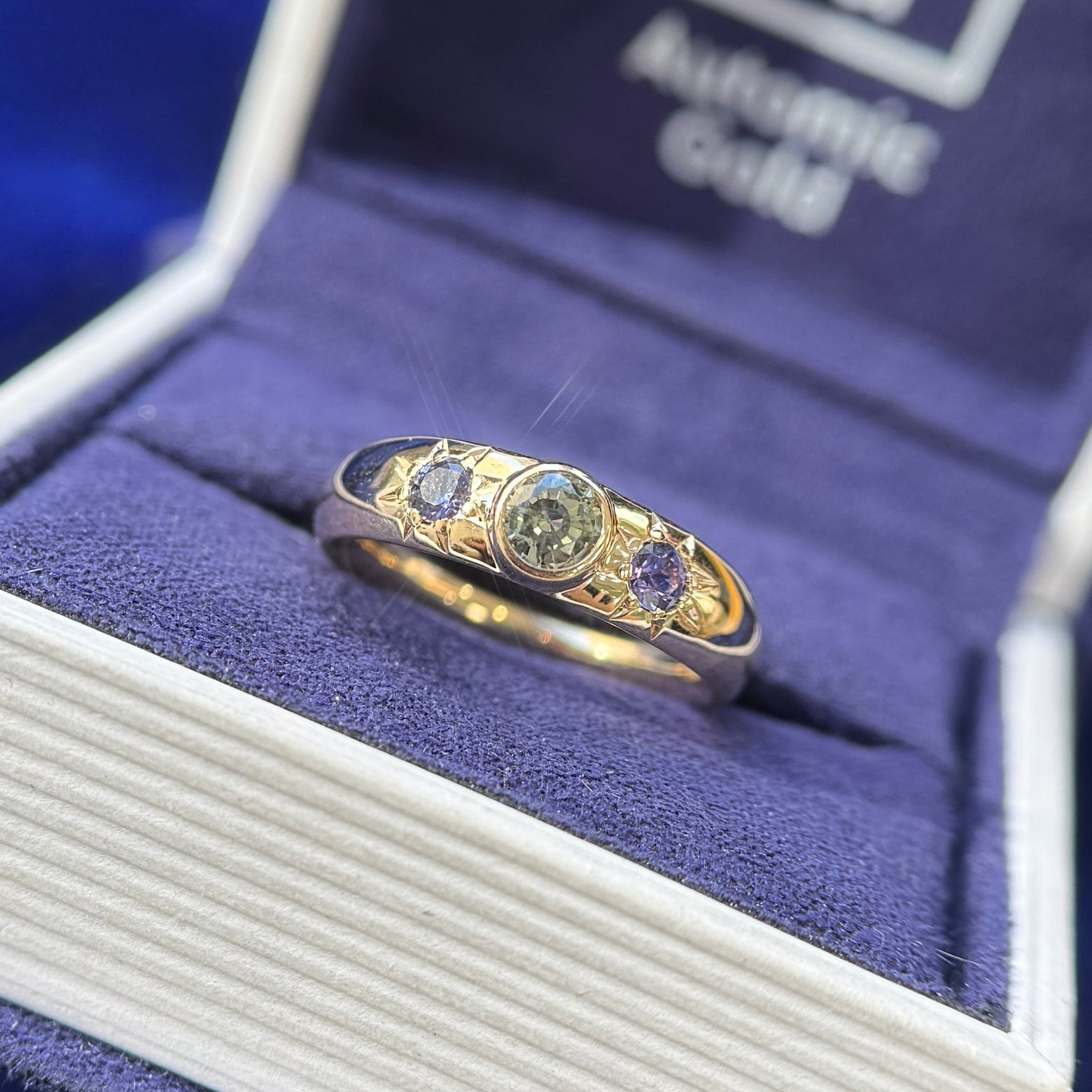 14k Yellow Gold with Round Green Sapphire and 2pc Star-Set Purple Sapphires on 4mm Curvy Mirror Band Custom Ring, Size 5.25