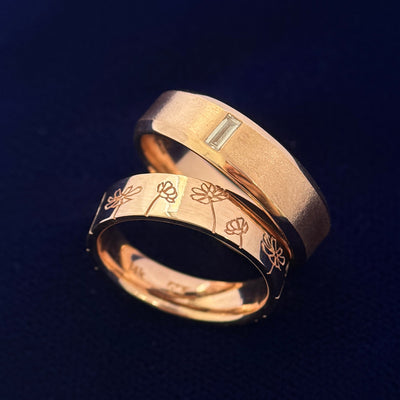 14k Rose Gold Cosmos Flower Pattern Engraved all around on 5mm Industrial Mirror Band Custom Ring, size 6.5 and 14k Rose Gold with 2x4mm Baguette Lab Diamond on 6mm Beveled Band Custom Ring, size 8.75