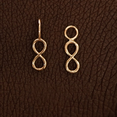 Two 14 karat Rose solid gold Infinity Charms shown in the For Chain and For Earring options
