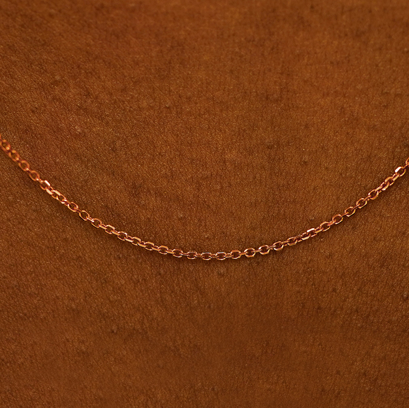 Close up view of cable chain on the model's neck