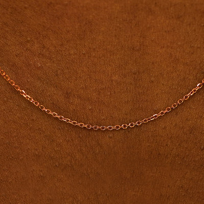 Close up view of cable chain on the model's neck