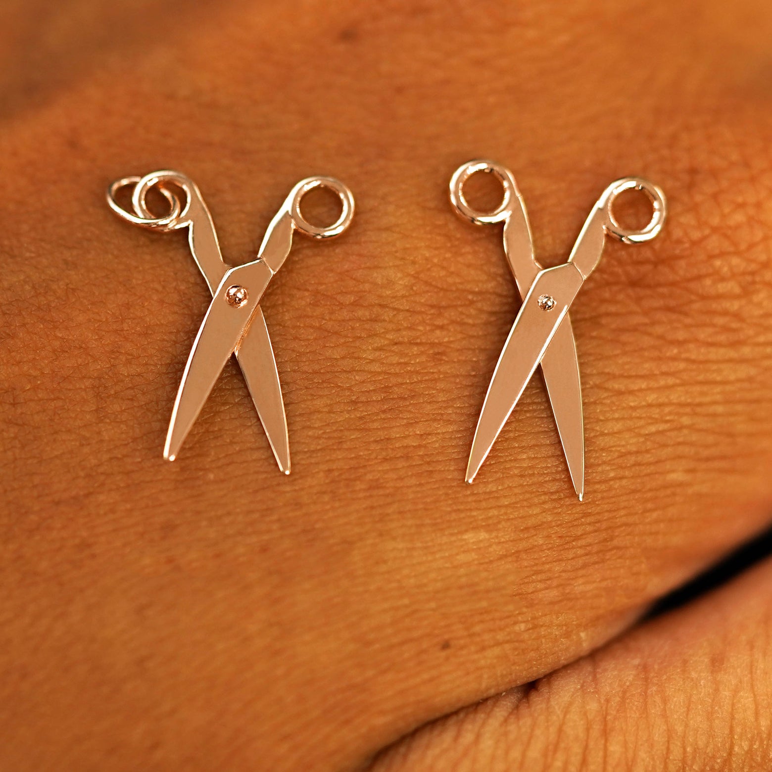 Two 14 karat Rose solid gold Scissors Charms shown in the For Chain and For Earring options