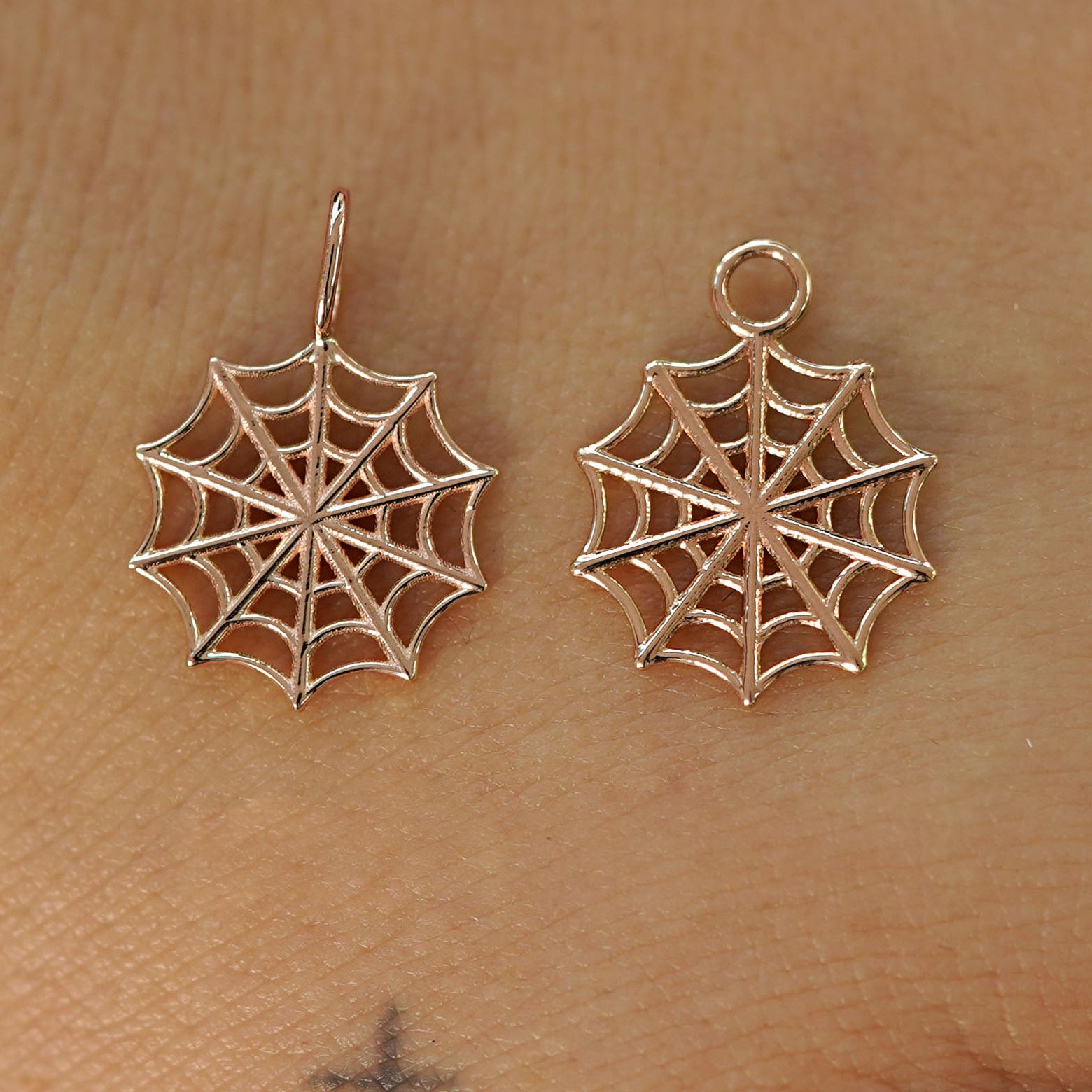 Two 14 karat Rose solid gold Spider Web Charms shown in the For Chain and For Earring options