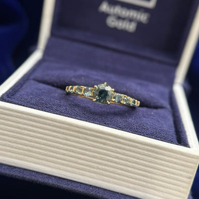 18k Yellow Gold Bead-prongs-set 5x2mm Round Teal Sapphires on 4mm Mix Mirror Band Custom Ring, size 10 and 18k Yellow Gold and 4mm Round Teal Sapphire with 8pc Graduating is size Teal Sapphires on Custom Ring, size 6