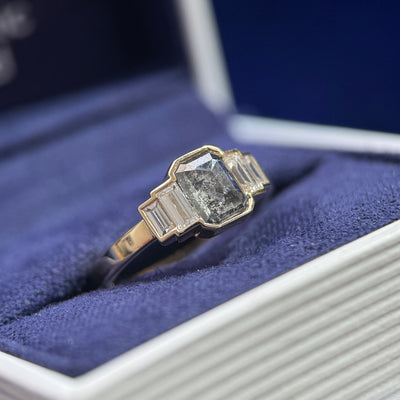 side view of 14k Yellow Gold and 1ct Salt-and-pepper Emerald-cut Diamond with 4pc Baguette Lab Diamonds on 2mm Band Custom Ring, size 5.25
