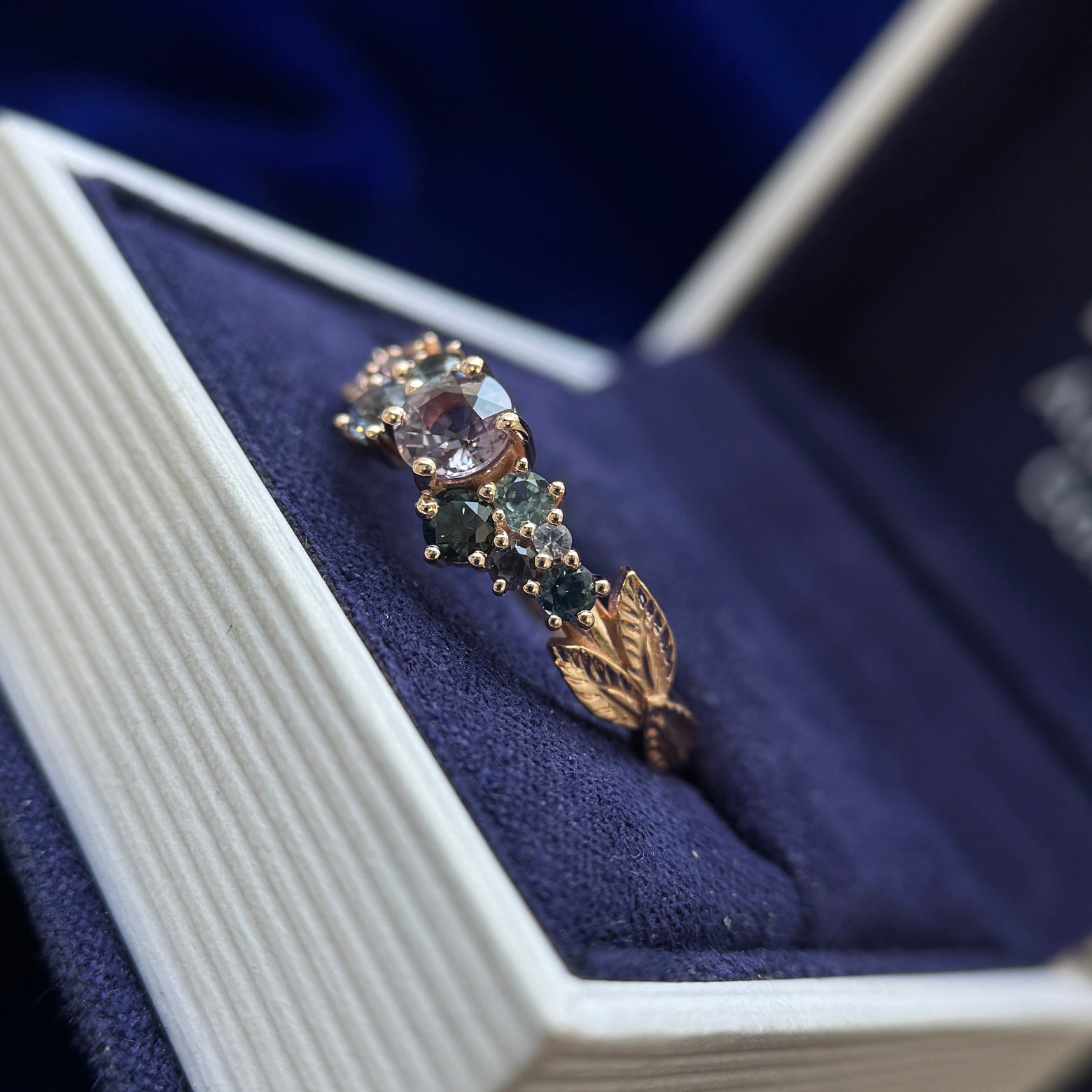 14k Rose Gold 5mm Round Purple Sapphire with Clusters of Blue, Teal and Purple Sapphires on Leaves Tapered Band Custom Ring, Size 10.25