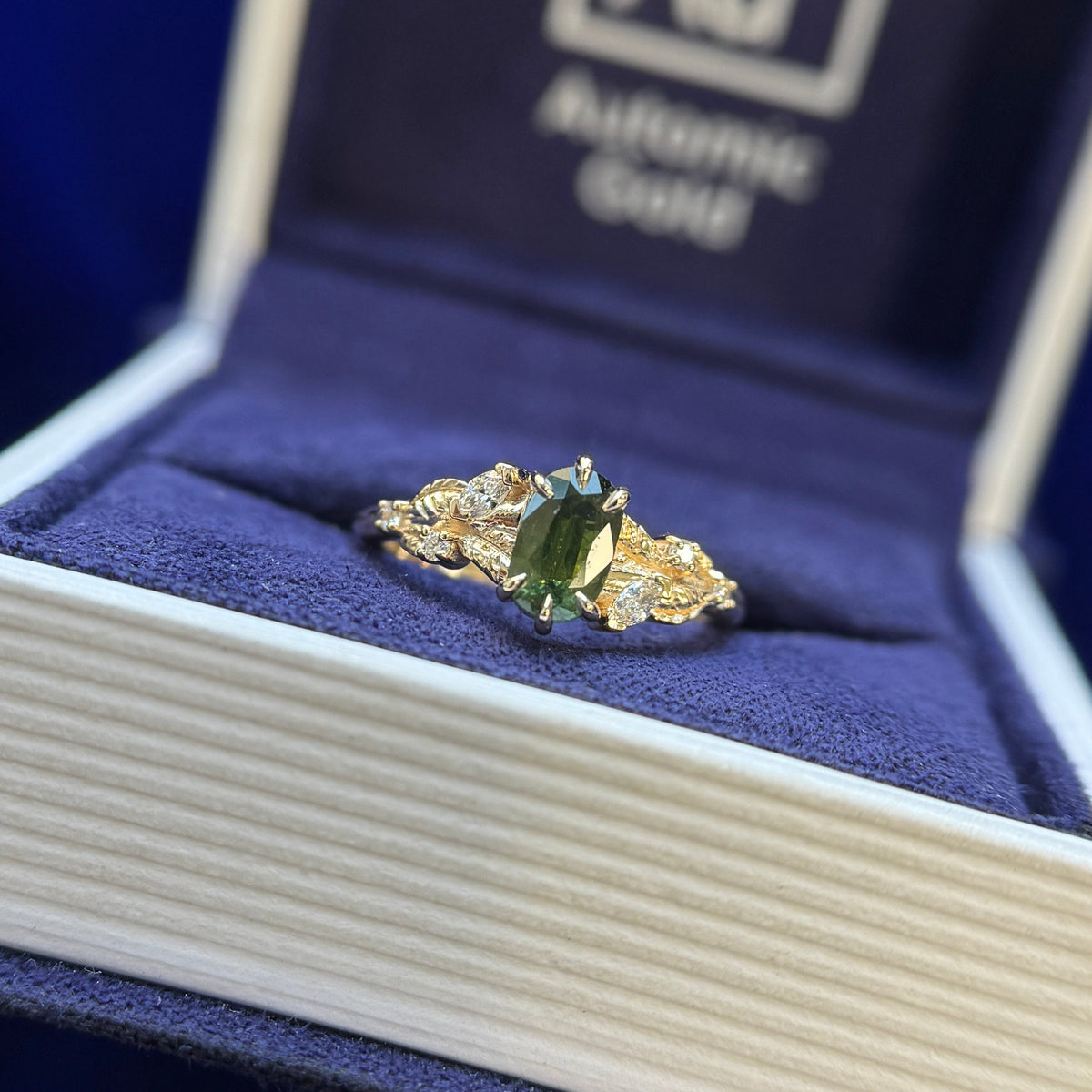 14k Yellow Gold Prongs-set 0.77ct Green Oval Sapphire with Lab Diamond Accents and Leaves on Tapered Band, size 4