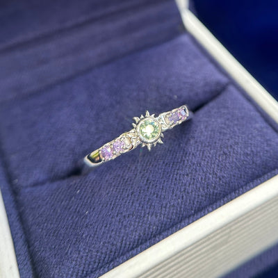 14k White Gold Bezel-set Light Green Sapphire with Small Purple Sapphires on Custom Sun and Moon Ring, Size 7.5