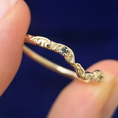 Model holding 14k Yellow Gold 2pc small Sapphires on Filigree Nesting Band Custom ring, 2 grams, Size 8