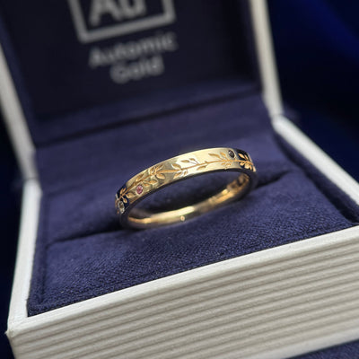 14k Yellow Gold Flush-set Pink and Light Green Sapphires, Garnet, and Lab Diamonds with Leaves Engraved on 3.2mm Industrial Mirror Band Stacking with Ring