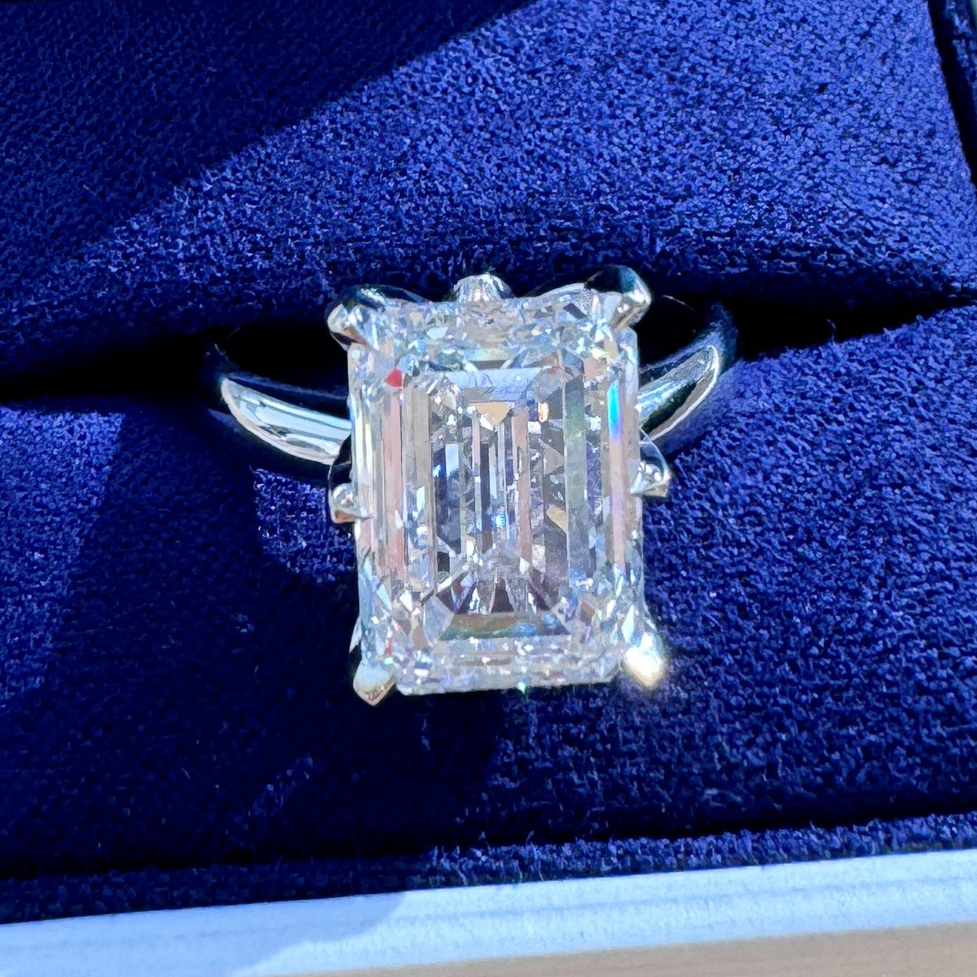 side view of 14k White Gold 6-prongs-set 6ct Emerald-cut Lab Diamond on 3mm Curvy Mirror Band Custom Ring, size 6.25