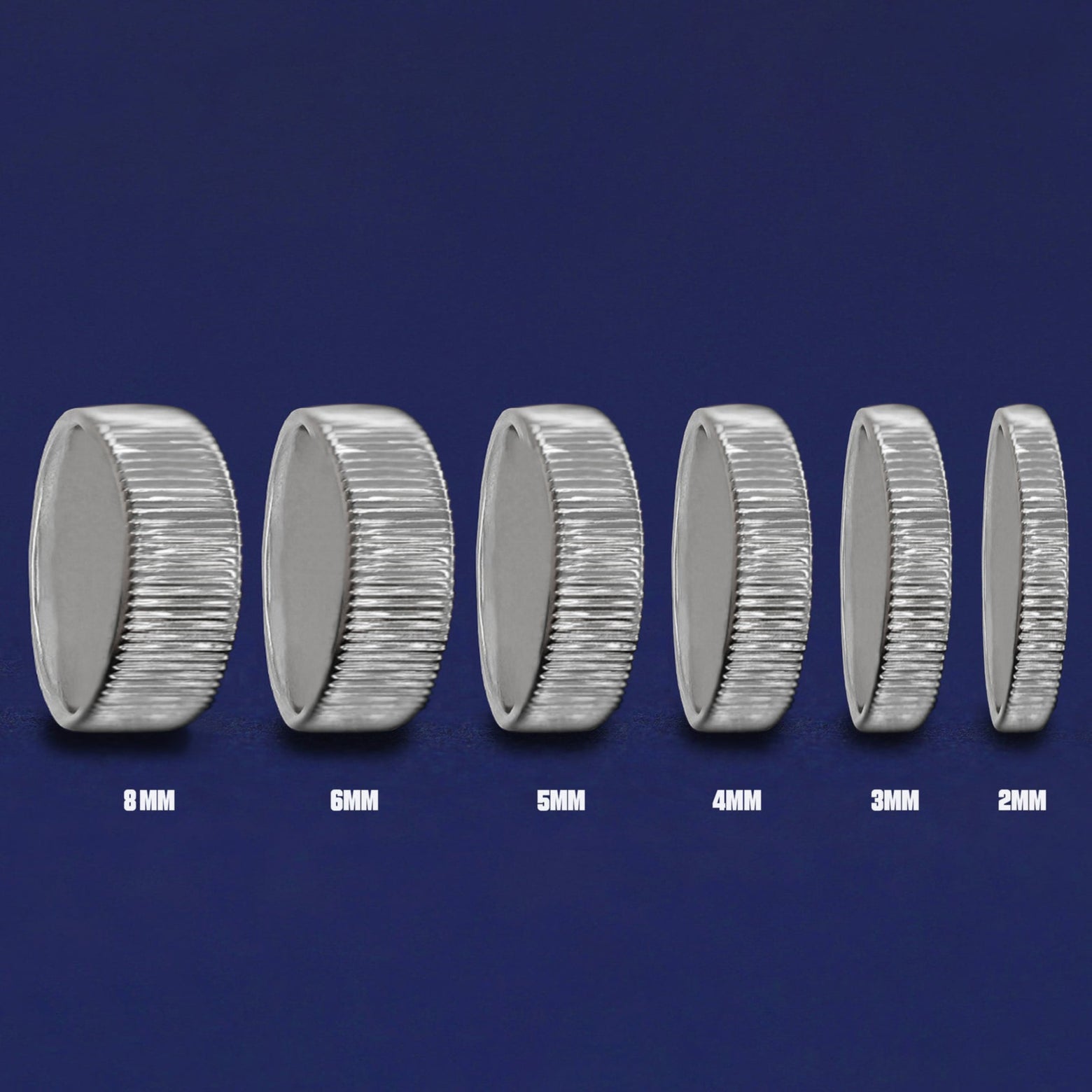 Seven versions of the Silver Edge Band showing the different thickness options of the ring from 8mm to 2mm