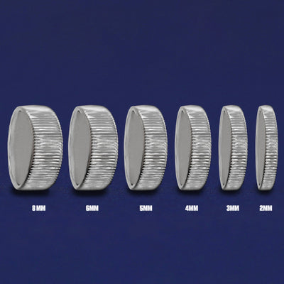 Seven versions of the Silver Edge Band showing the different thickness options of the ring from 8mm to 2mm
